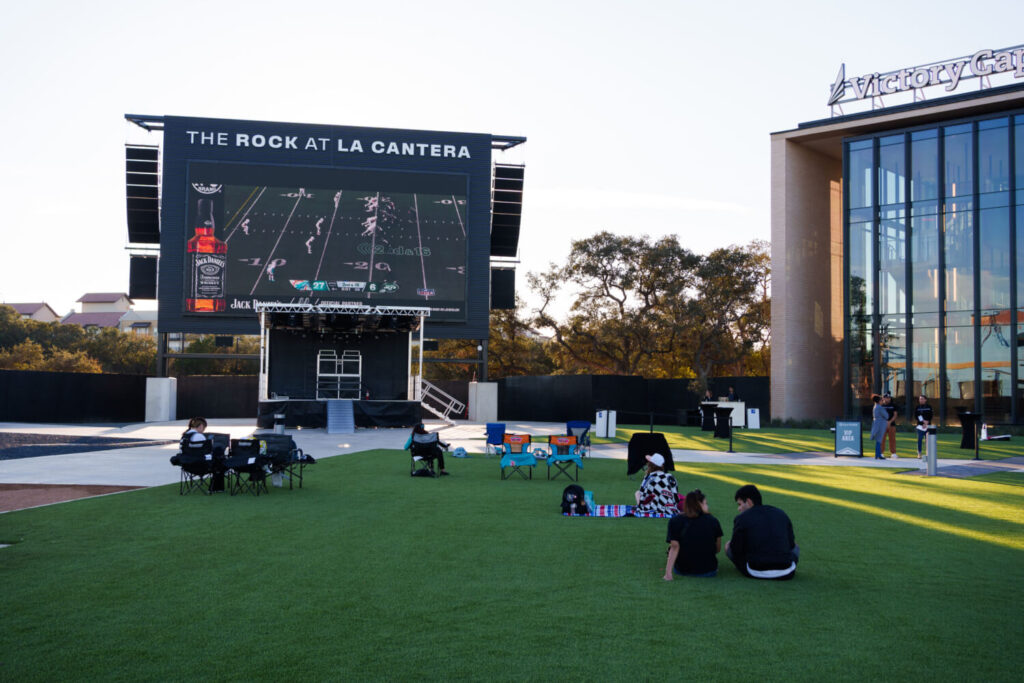 The Rock Plaza with a large TV. | Roca and Martillo Restaurant at La Cantera